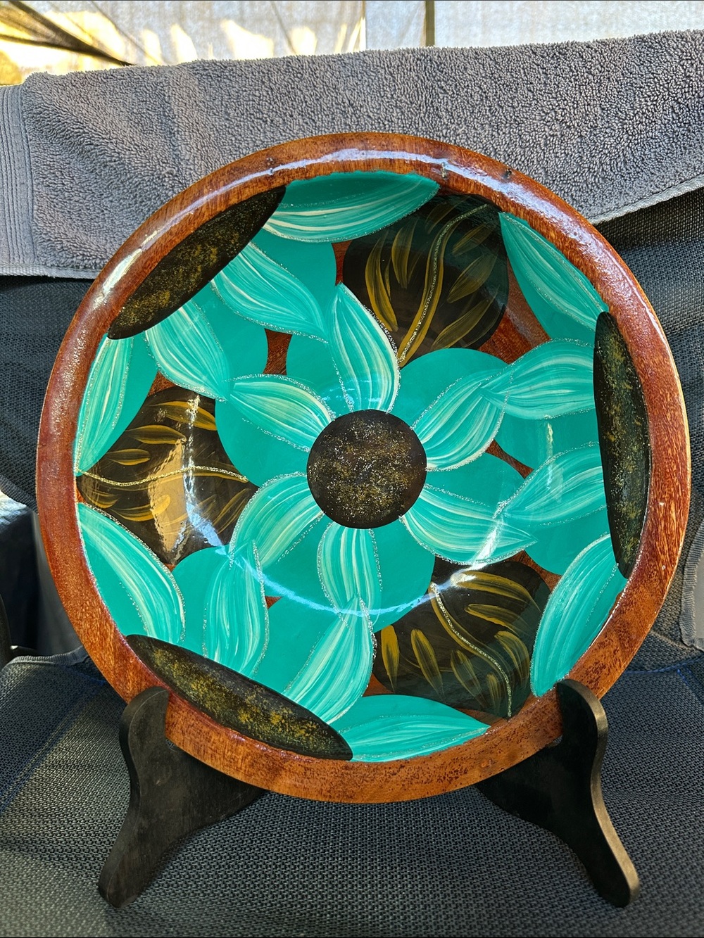 Mexican wooden bowl with gorgeous teal and brown painting.